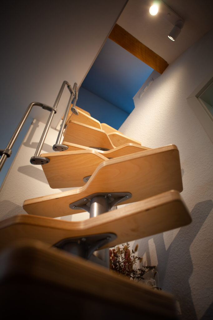 Slaapgedeelte op de bovenverdieping van vakantiewoning Canhusen onder de vliering